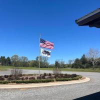 United States and Rabbit Ridge Farms Flag flying in front of Rabbit Ridge Farms